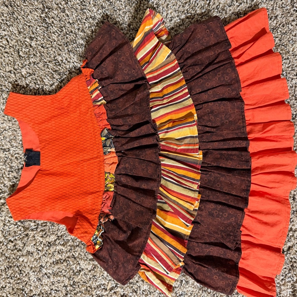 Beautiful and Colorful Tiered Sleeveless Fall dress.